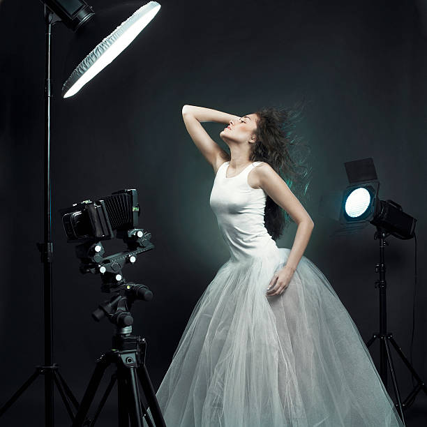 istock Beautiful woman pose in photo-studio 153766787