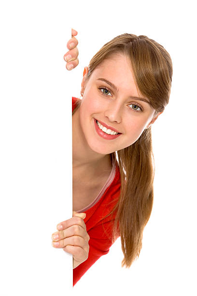 istock Beautiful young woman holding placard 153767151