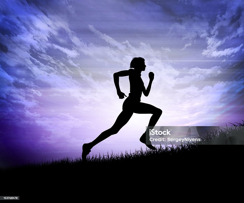 Silhouette of a man Silhouette of a man running against the evening sky Activity Stock Photo