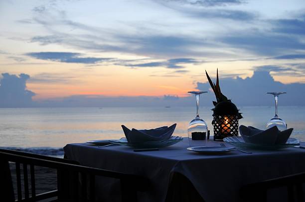 istock Dinner table on the beach at sunset in Bali, Indonesia 153768586