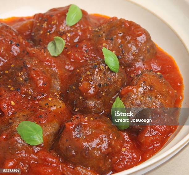 Italian Beef Meatballs In Tomato Sauce Stock Photo - Download Image Now - Basil, Beef, Bowl