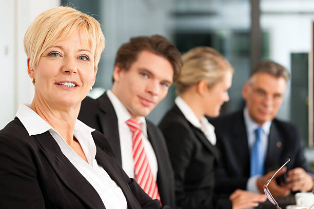 istock Business with female boss - team in office 153769032