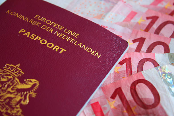 istock Dutch Passport and European Currency 153769162
