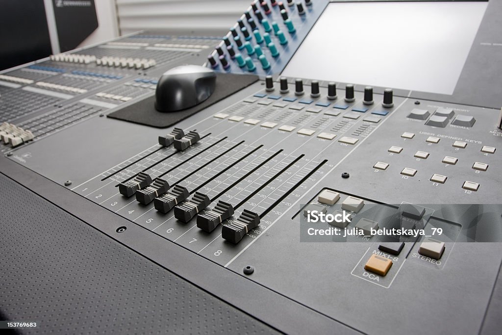 Sound mixing console A photography of sound mixing console Adjusting Stock Photo