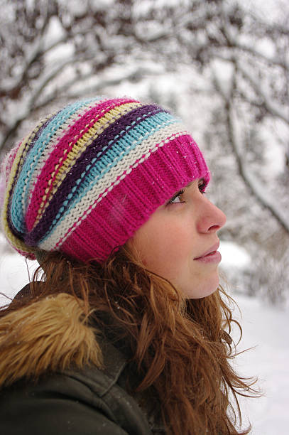 Pretty girl outside in the snow