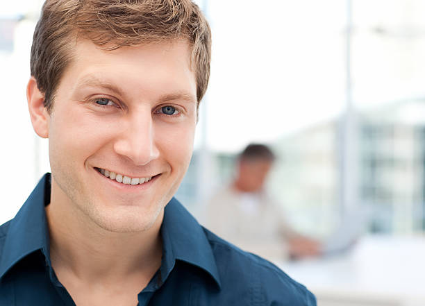 istock Happy businessman in his office 153770211
