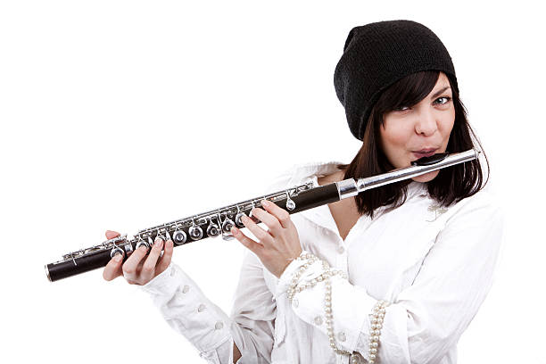 istock Girl playing on flute 153771211