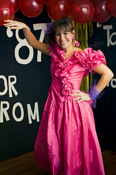 istock A prom queen in a bright pink dress 153771271