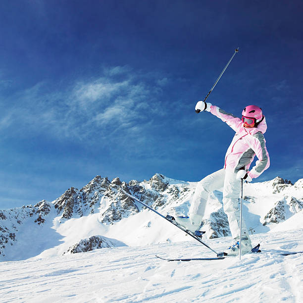 Male skier.Skiing Carving at Zermatt. Snow skiing at high speed against blue sky . SEE ALSO: