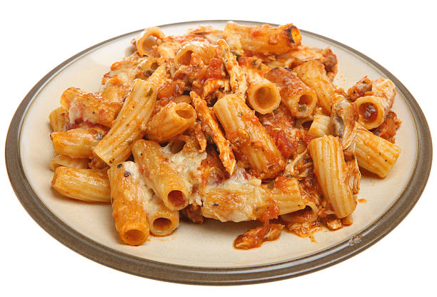 Baked Pasta with Chicken and Cheese Baked rigatoni pasta with tomato sauce, chicken and cheese. chicken rigatoni stock pictures, royalty-free photos & images