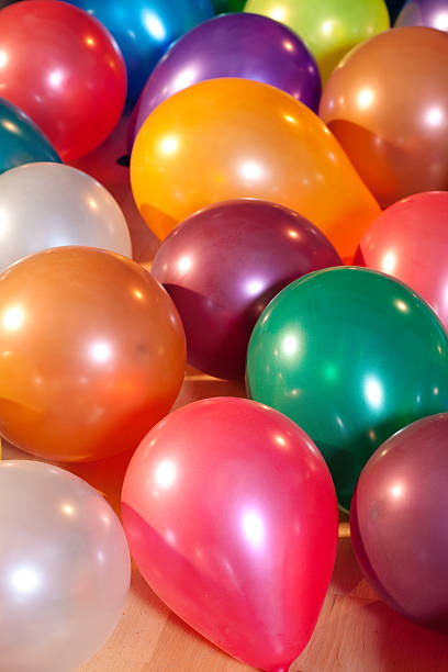 istock Colorful balloons at a party 153772937