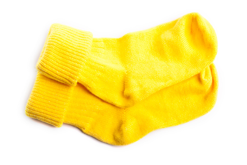 Yellow socks isolated on white