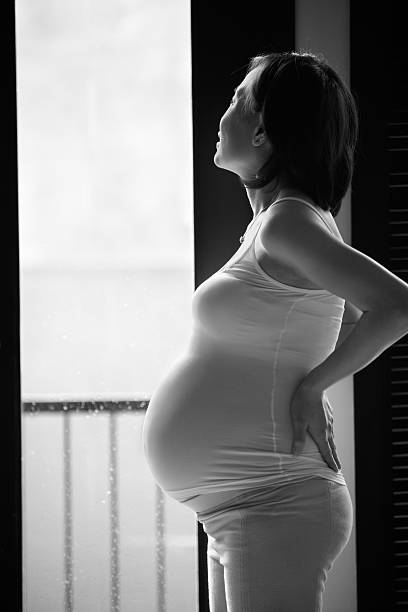 istock Pregnant lady looking away 153773654