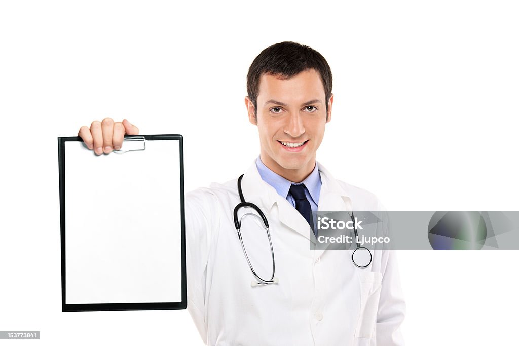 Smiling doctor holding a white blank card A smiling doctor showing a white blank card isolated on white background, focus on face Adult Stock Photo