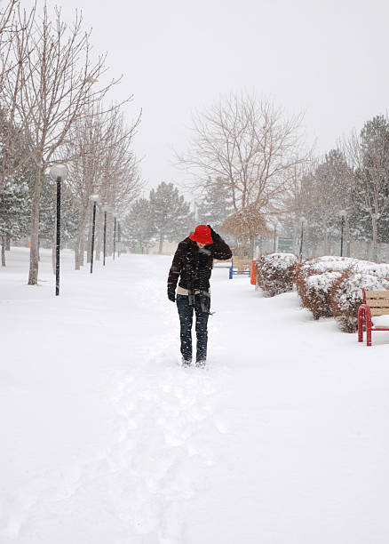 istock young woman in the snow 153773944