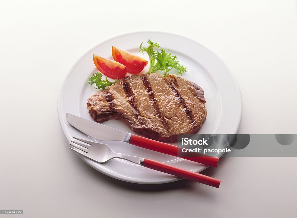 Zubereitetes steak mit Tomaten und escarole - Lizenzfrei Abnehmen Stock-Foto