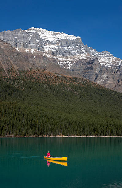 istock Woman Canoeing on Moraine Lake , Alberta, Canada 153774399