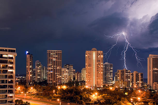 istock Forked lightening at night over a busy city 153774693