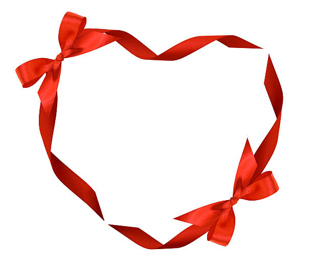 Heart from red ribbons and bows stock photo