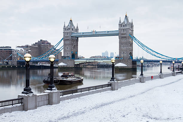 london tower bridge in snow london tower bridge by river thames in snow winter wonderland london stock pictures, royalty-free photos & images