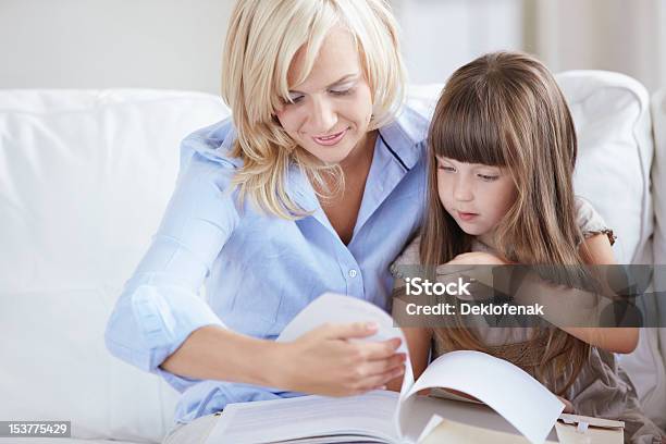 Reading Books Stock Photo - Download Image Now - 30-39 Years, Activity, Adult