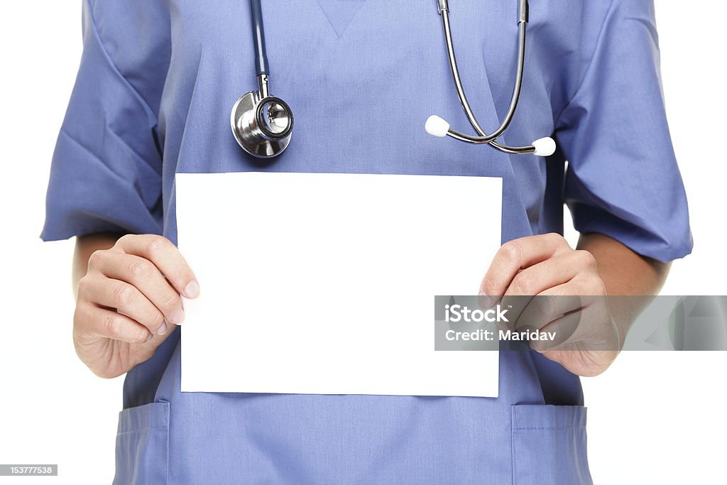 Doctor showing blank sign Doctor or xwoman nurse showing blank empty sign with copy space for text. Isolated on white background. Holding Stock Photo