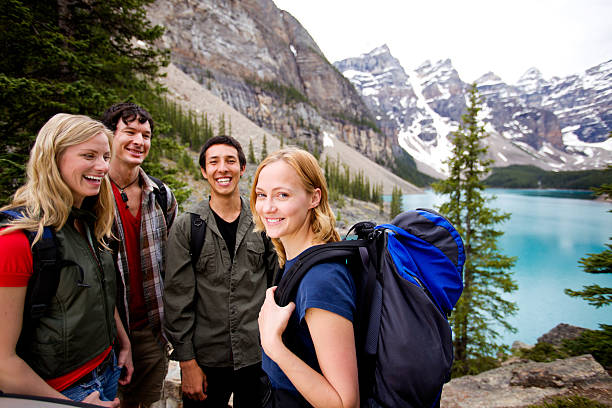 Camping Friends in Mountains A group of friends on a hiking / camping trip in the mountains moraine lake photos stock pictures, royalty-free photos & images