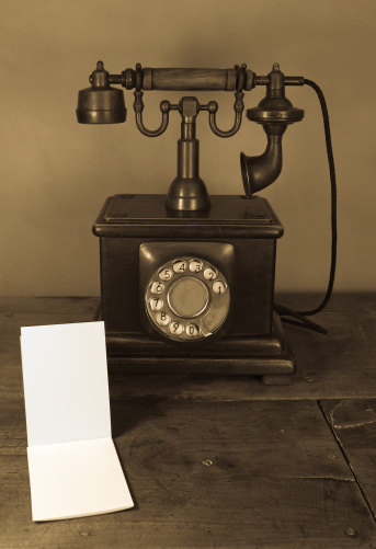 Viejo teléfono & Bloc de notas photo