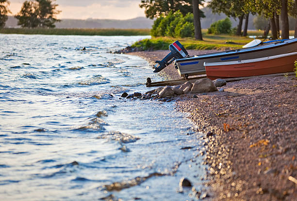 Lake bank with boats. Finland landscape.