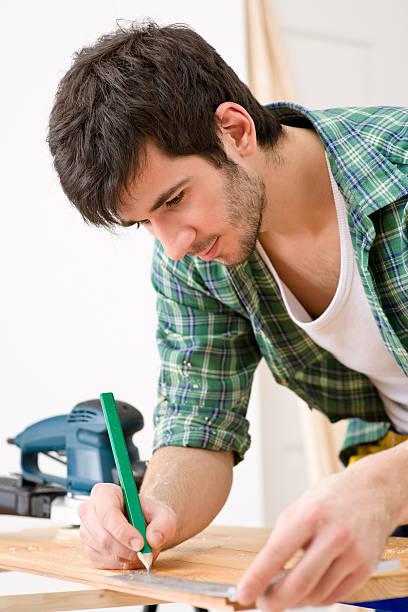 istock Home improvement - handyman prepare wooden floor 153778470