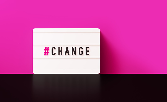 #Change written white lightbox before pink wall. Horizontal composition with copy space.