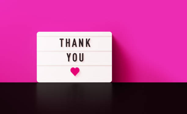 istock Thank You Written White Lightbox Before Pink Wall 1537787184