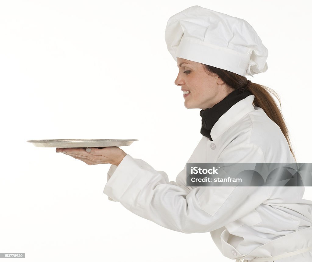 Chef feminino Olhando para a placa - Royalty-free Perfil - Vista Lateral Foto de stock