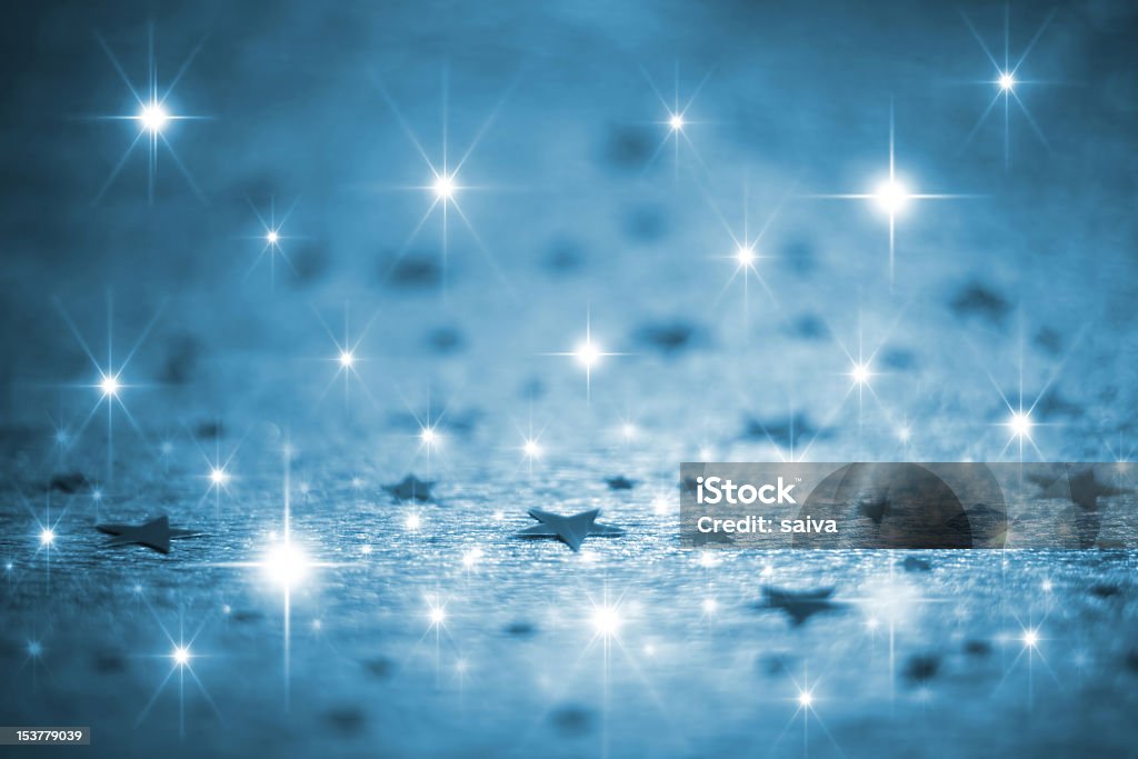 Shiny blue stars and sparkles background Blue winter background with stars Blue Stock Photo
