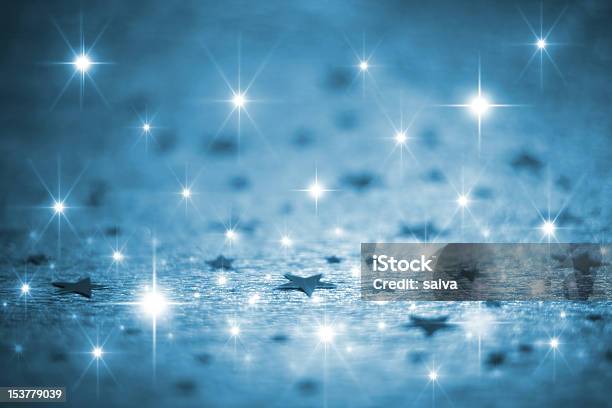 Shiny Blue Stars And Sparkles Background Stock Photo - Download Image Now - Blue, Bright, Christmas