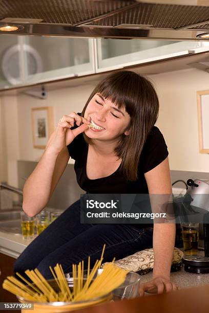 Woman Tasting Dinner Stock Photo - Download Image Now - Adult, Adults Only, Cheerful