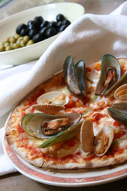 sea food pizza stock photo