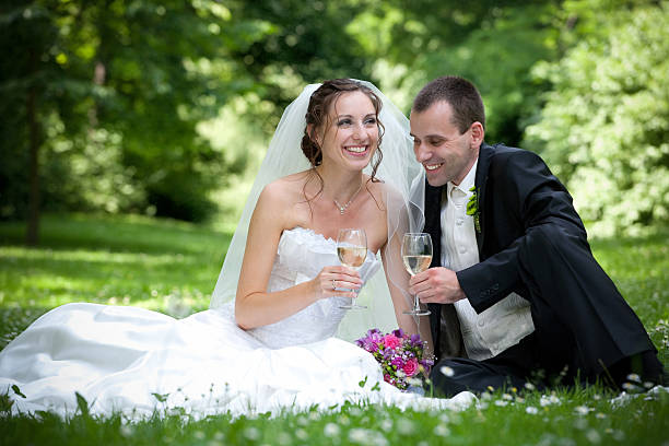 istock wedding couple in the park 153779697