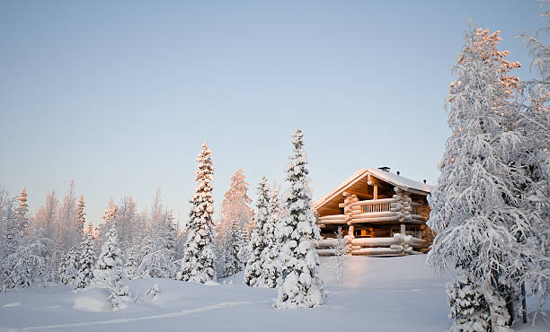 istock A cabin in the woods at wintertime 153779862