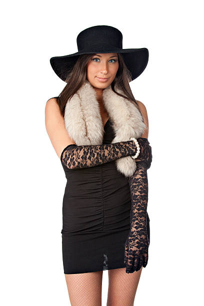 istock young beautiful girl with black hat 153780547
