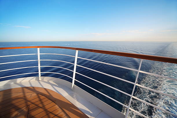 Wide angle shot of vast sea view from stern of cruise ship stock photo