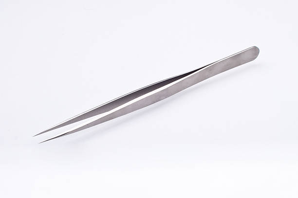 Sharp-edge precision surgical tweezers stock photo