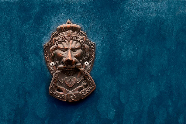 istock Doorknocker on a metal door 153781848