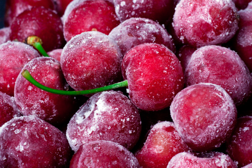 Ripe frozen sweet cherry close-up.