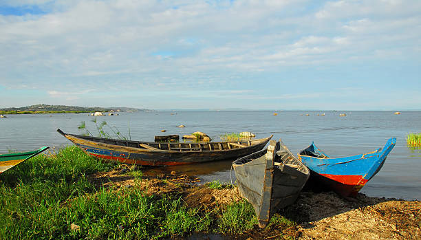lake old boats on Lake Victoria, Tanzania lake victoria stock pictures, royalty-free photos & images