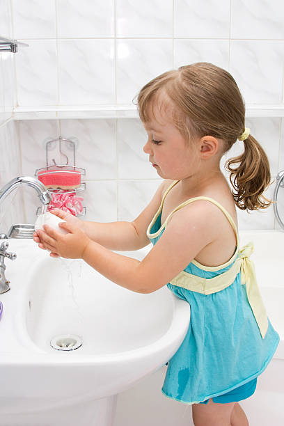 istock little girl in bathroom 153782863