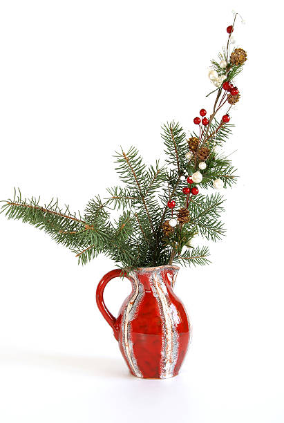 istock Christmas decoration in colored glass vase on white background 153782925