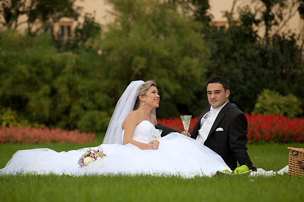 istock wedding couple in the park 153783126