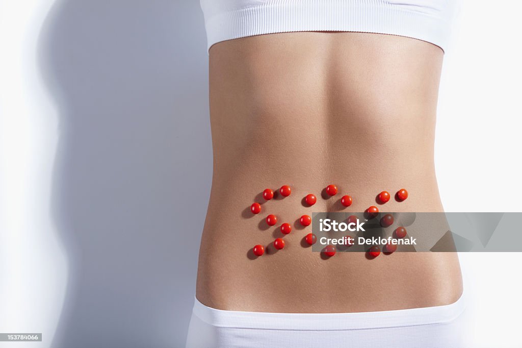 A flat stomach with SOS in red bubbles http://content.foto.mail.ru/mail/deklo-design/2/i-39.jpg Stomachache Stock Photo