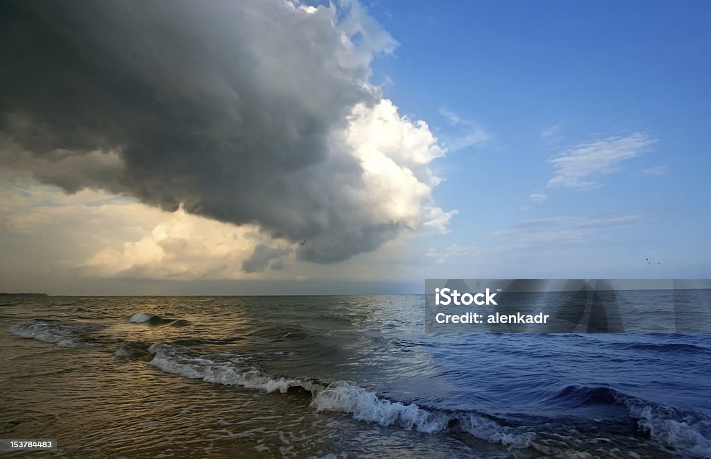 storm approaching Storm clouds approaching from the roller tropical beach Approaching Stock Photo